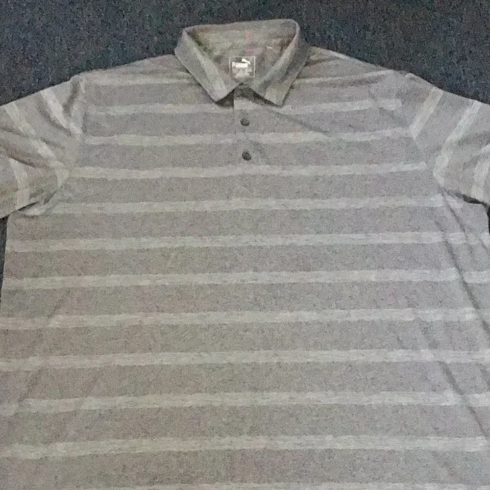 PUMA GOLF SHIRT.